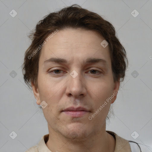 Neutral white adult male with short  brown hair and brown eyes