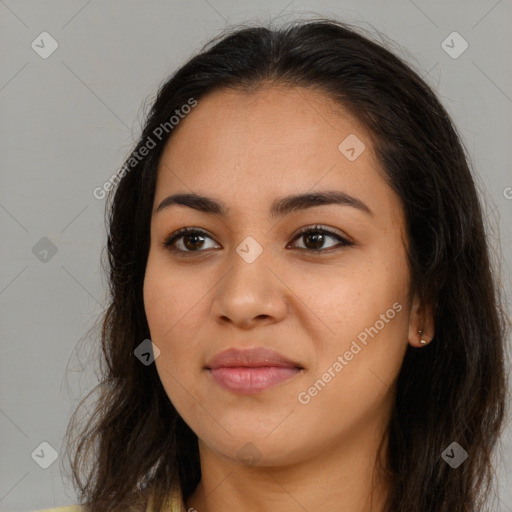 Joyful latino young-adult female with long  brown hair and brown eyes
