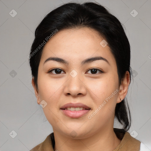 Joyful asian young-adult female with medium  black hair and brown eyes