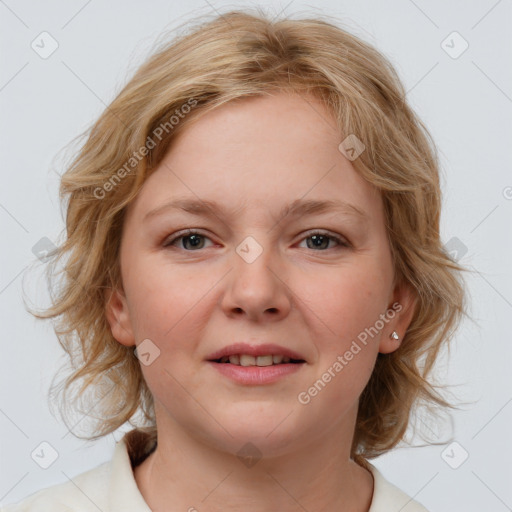 Joyful white young-adult female with medium  brown hair and blue eyes