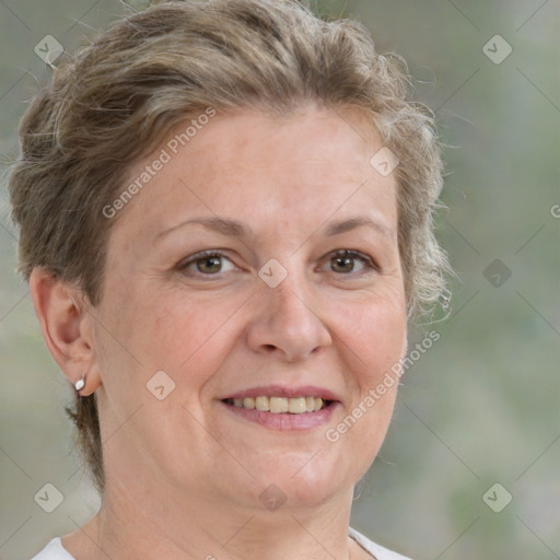 Joyful white adult female with short  brown hair and grey eyes