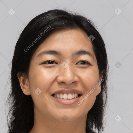 Joyful asian young-adult female with long  brown hair and brown eyes