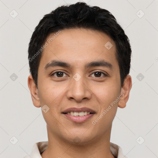 Joyful latino young-adult male with short  black hair and brown eyes