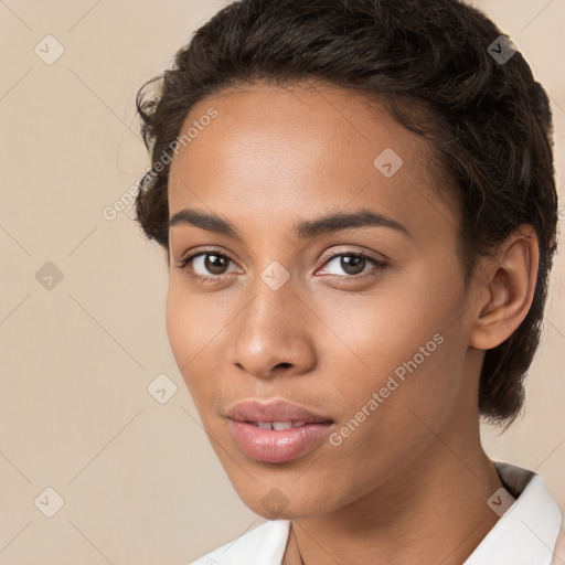 Neutral white young-adult female with short  brown hair and brown eyes