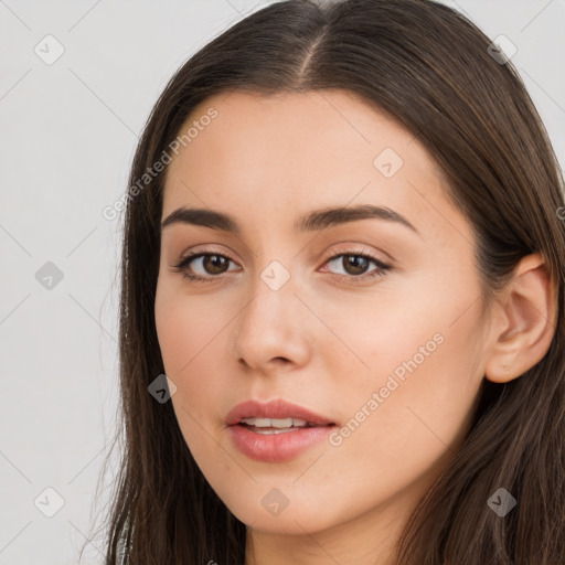 Neutral white young-adult female with long  brown hair and brown eyes