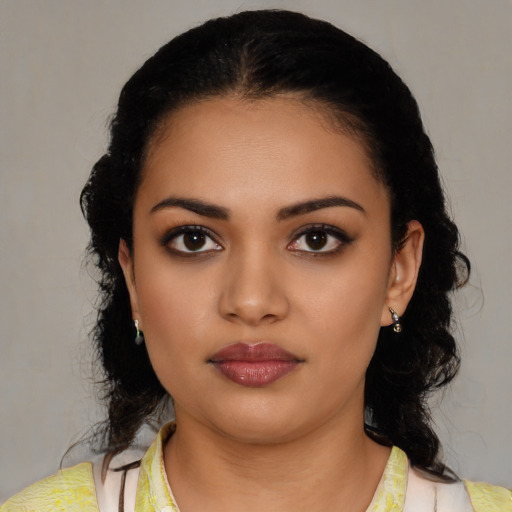 Neutral latino young-adult female with medium  black hair and brown eyes