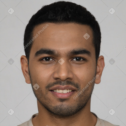 Joyful latino young-adult male with short  black hair and brown eyes