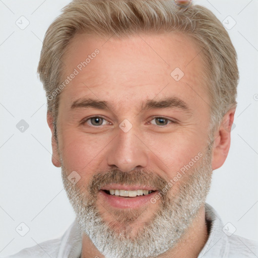 Joyful white adult male with short  brown hair and grey eyes