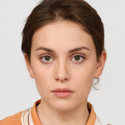 Neutral white young-adult female with medium  brown hair and brown eyes