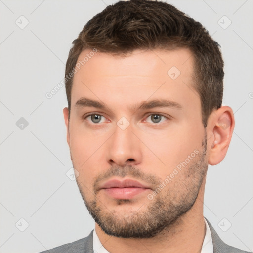 Neutral white young-adult male with short  brown hair and brown eyes