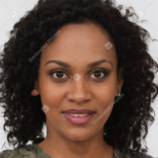 Joyful black young-adult female with long  brown hair and brown eyes