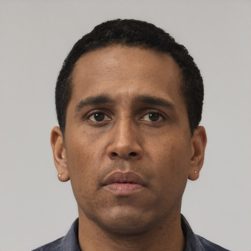 Neutral black young-adult male with short  black hair and brown eyes
