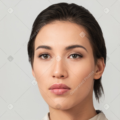 Neutral white young-adult female with medium  brown hair and brown eyes