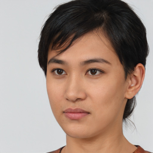 Neutral asian young-adult female with medium  black hair and brown eyes