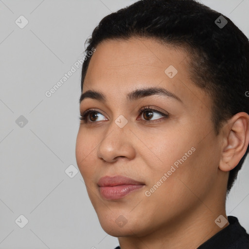 Joyful latino young-adult female with short  black hair and brown eyes