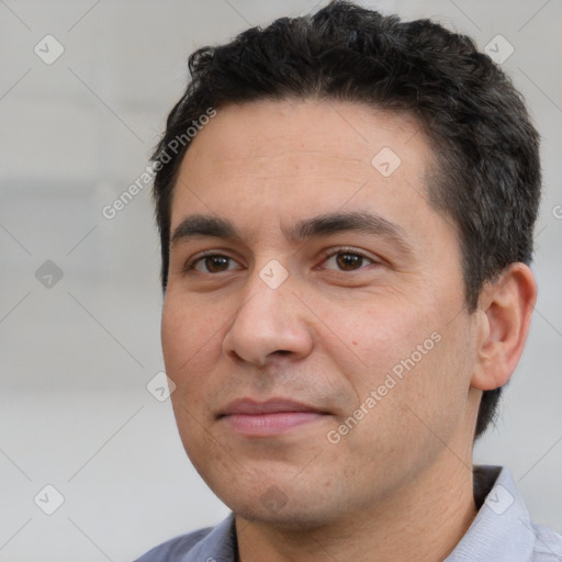 Joyful white young-adult male with short  black hair and brown eyes