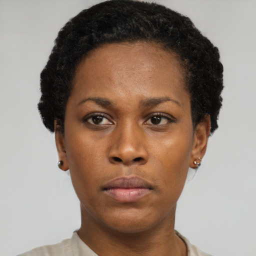Neutral black young-adult female with short  black hair and brown eyes