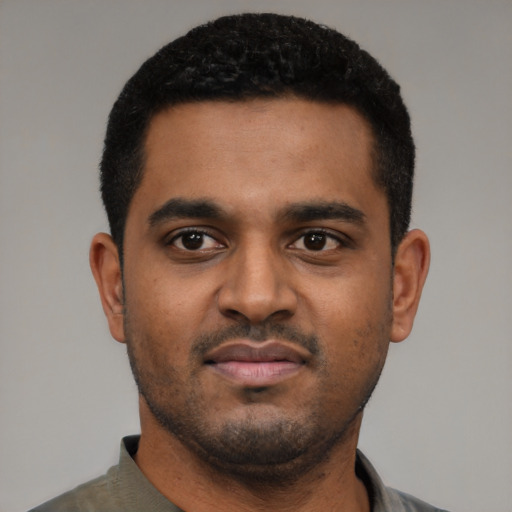 Neutral black young-adult male with short  black hair and brown eyes