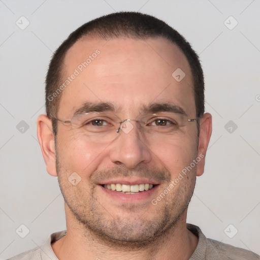 Joyful white adult male with short  brown hair and brown eyes