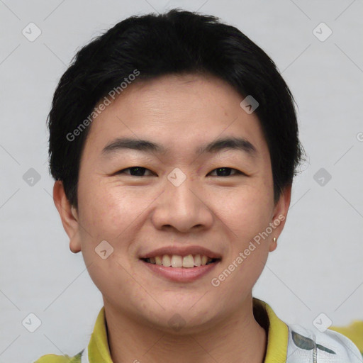 Joyful asian young-adult male with short  black hair and brown eyes