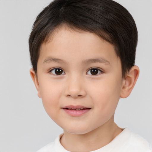 Joyful white child female with short  brown hair and brown eyes