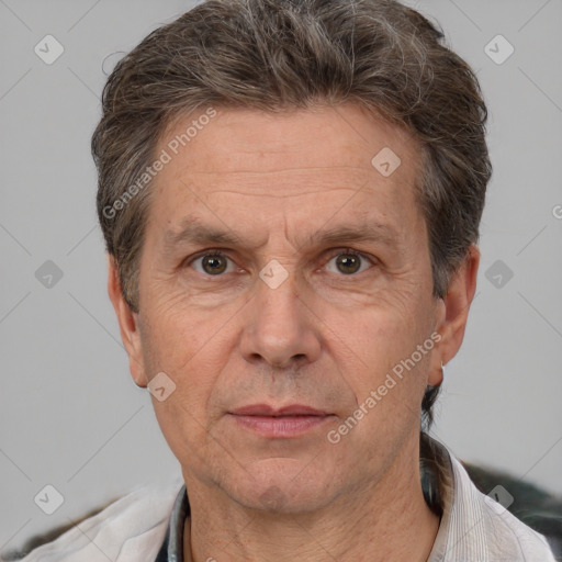 Joyful white middle-aged male with short  brown hair and brown eyes