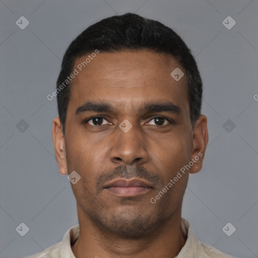 Neutral latino young-adult male with short  black hair and brown eyes