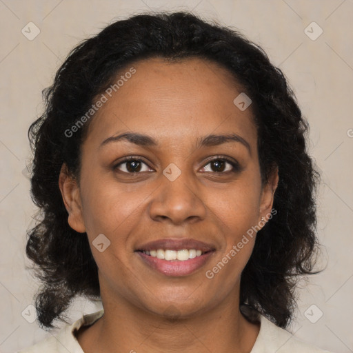 Joyful black young-adult female with medium  brown hair and brown eyes