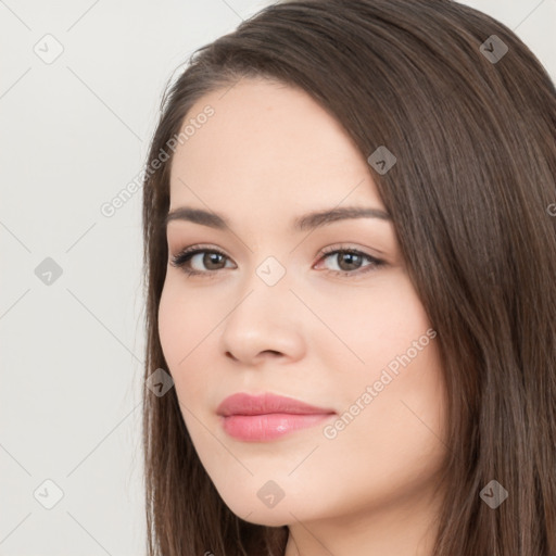 Neutral white young-adult female with long  brown hair and brown eyes