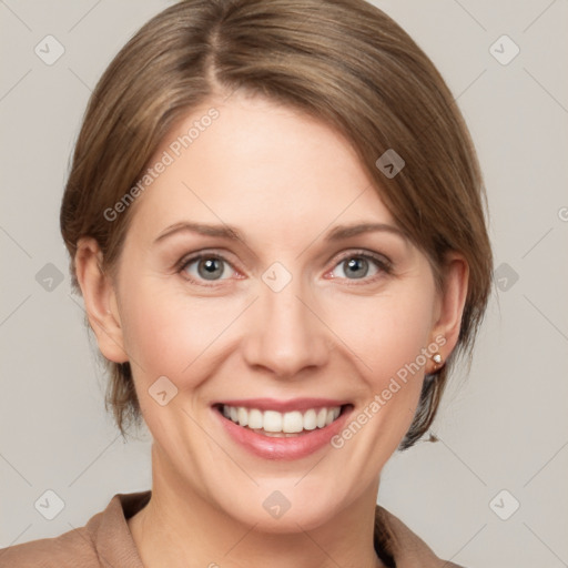 Joyful white young-adult female with medium  brown hair and grey eyes