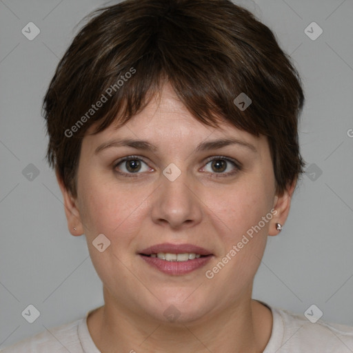 Joyful white young-adult female with short  brown hair and grey eyes