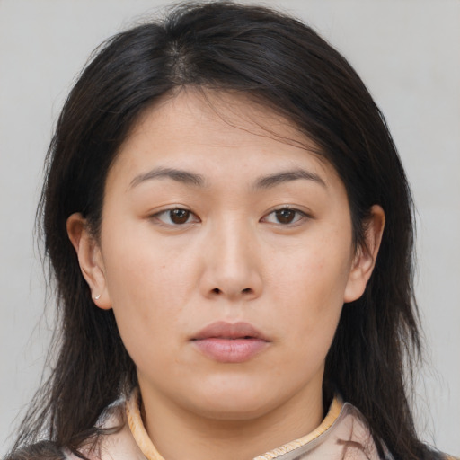 Neutral asian young-adult female with medium  brown hair and brown eyes