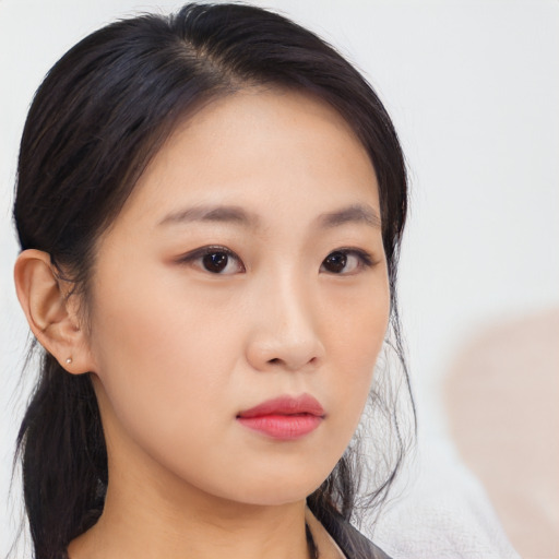 Neutral asian young-adult female with medium  black hair and brown eyes