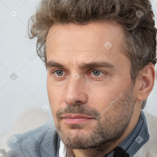 Neutral white adult male with short  brown hair and brown eyes