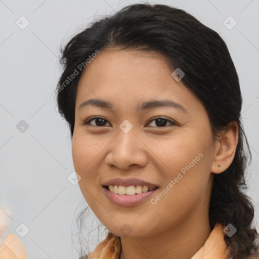 Joyful asian young-adult female with medium  brown hair and brown eyes