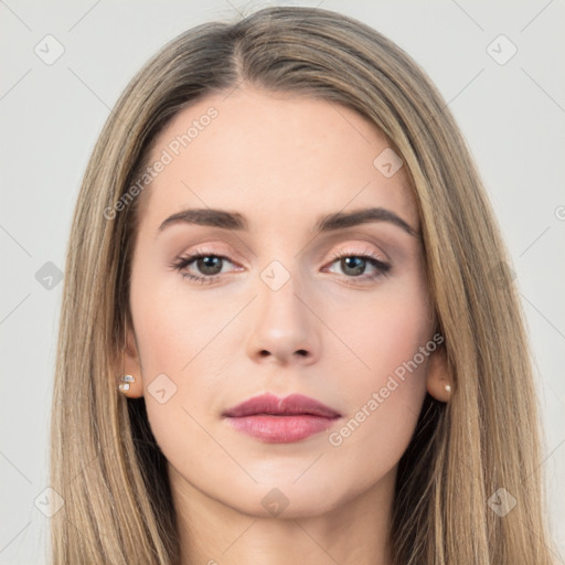 Neutral white young-adult female with long  brown hair and brown eyes