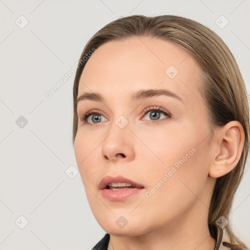 Neutral white young-adult female with long  brown hair and grey eyes