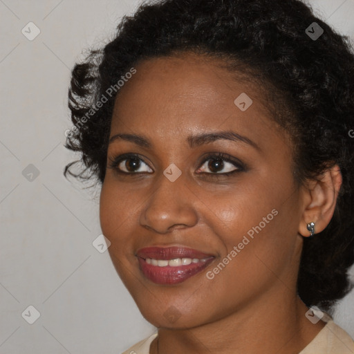 Joyful black young-adult female with medium  brown hair and brown eyes