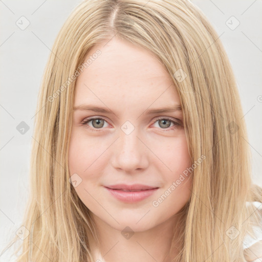 Joyful white young-adult female with long  brown hair and blue eyes