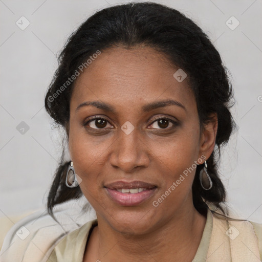 Joyful black adult female with medium  brown hair and brown eyes