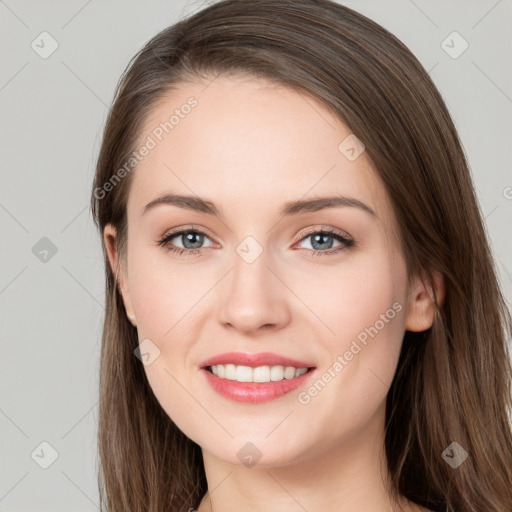 Joyful white young-adult female with long  brown hair and grey eyes