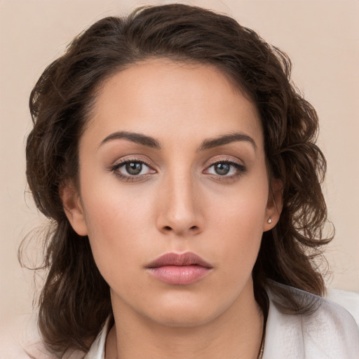 Neutral white young-adult female with medium  brown hair and brown eyes