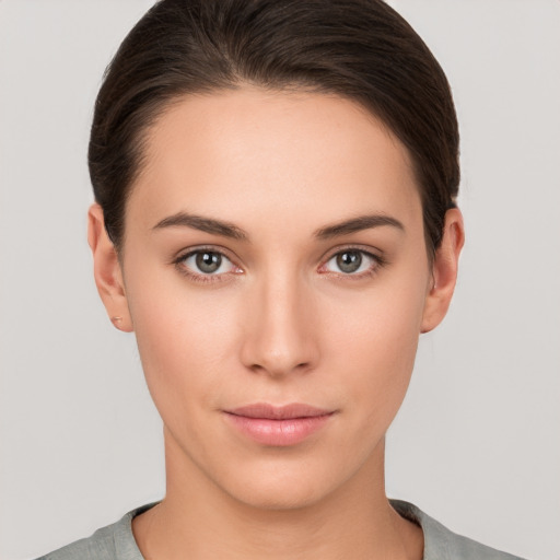 Neutral white young-adult female with short  brown hair and brown eyes