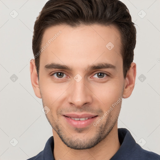 Joyful white young-adult male with short  brown hair and brown eyes