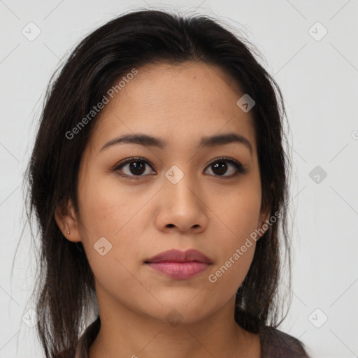 Neutral latino young-adult female with medium  brown hair and brown eyes