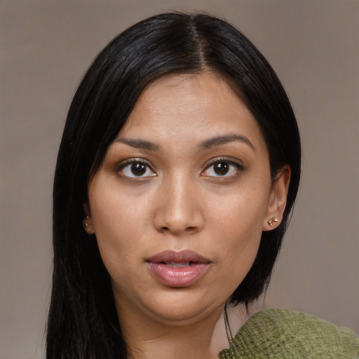Joyful asian young-adult female with long  black hair and brown eyes