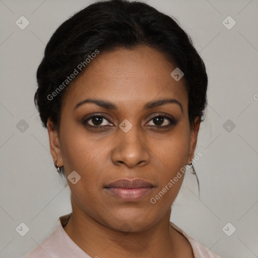 Joyful black young-adult female with short  brown hair and brown eyes