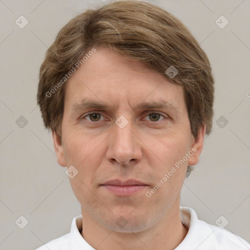 Joyful white adult male with short  brown hair and grey eyes