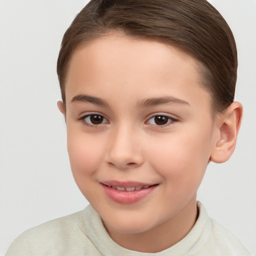 Joyful white child female with short  brown hair and brown eyes