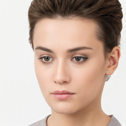 Neutral white young-adult female with short  brown hair and brown eyes